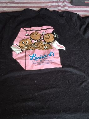 Next Level Apparel Black T-Shirt with Pink Leonard's Bakery Graphic